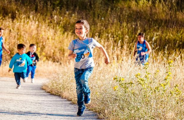 boy running on pathway