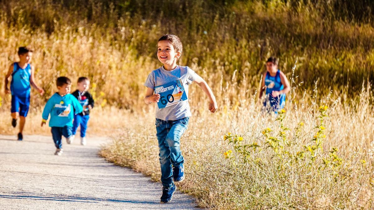 boy running on pathway