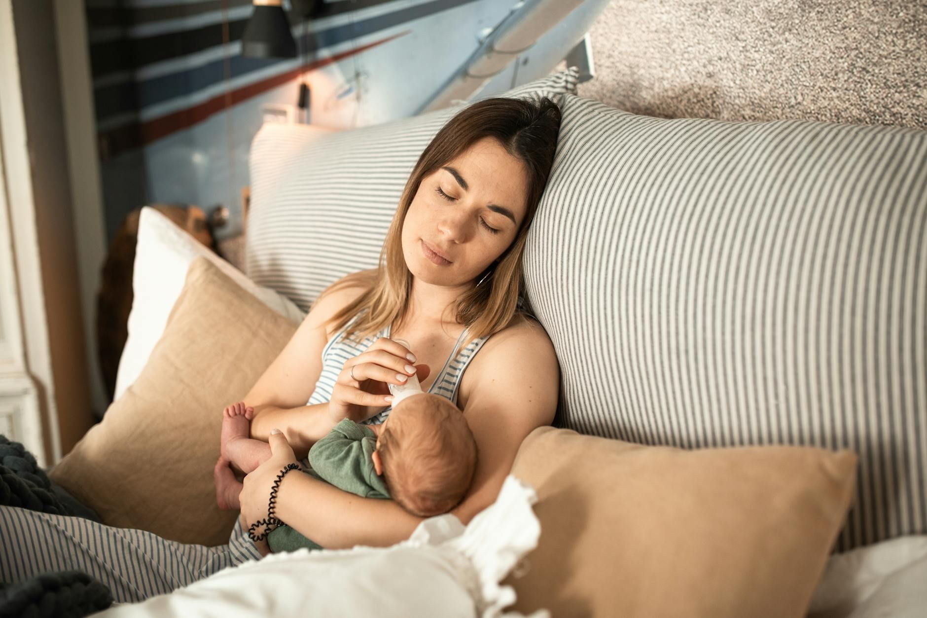 woman in white tank top lying on bed woman in white tank top lying on bed woman in white tank top lying on bed