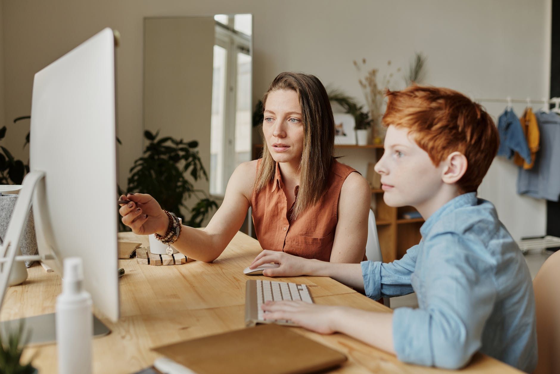 photo of woman tutoring young boy photo of woman tutoring young boy photo of woman tutoring young boy photo of woman tutoring young boy